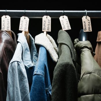 Clothes ready for Black Friday sale background.